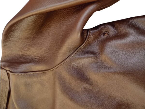 Side view brown leather bomber jacket